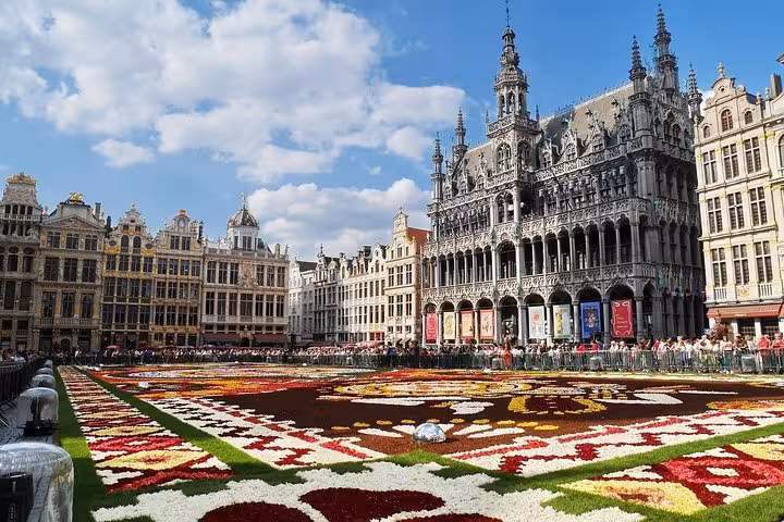 Grand Place Brussels with Flower Carpet and ornate guildhalls on a private half-day sightseeing tour