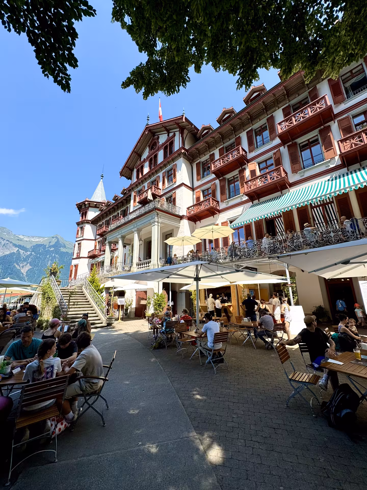 Grandhotel Giessbach terrace by Lake Brienz, a scenic stop on the Iseltwald and Giessbach e-bike tour
