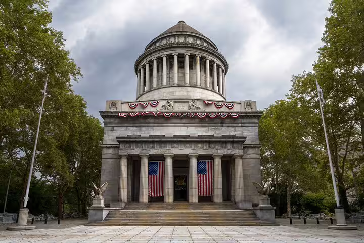 Grant's Tomb neoclassical monument with American flags and columns in New York City