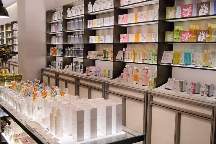Elegant Grasse perfume boutique showcasing luxury fragrance collections on a private Provence tour