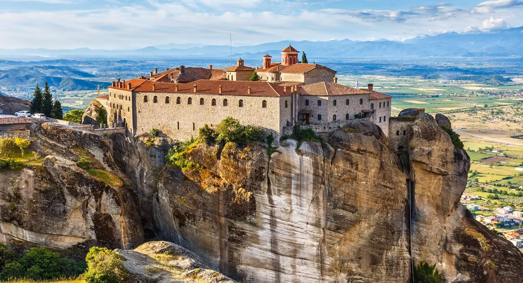 Great Meteoron Monastery perched on Meteora rocks with panoramic Thessaly plain views on a 4-day Greece tour