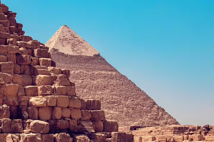 Close-up view of the Great Pyramid of Giza with ancient stone blocks, iconic stop on Cairo sightseeing tour