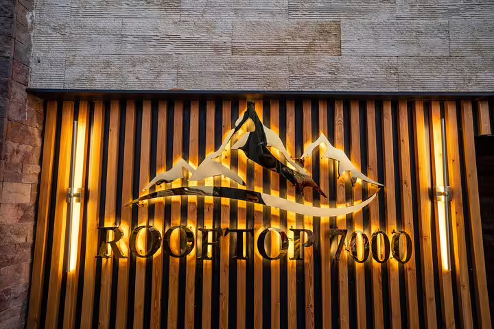 Great Pyramid Inn rooftop 7000 restaurant sign, popular lunch spot with Giza Pyramids view in Cairo