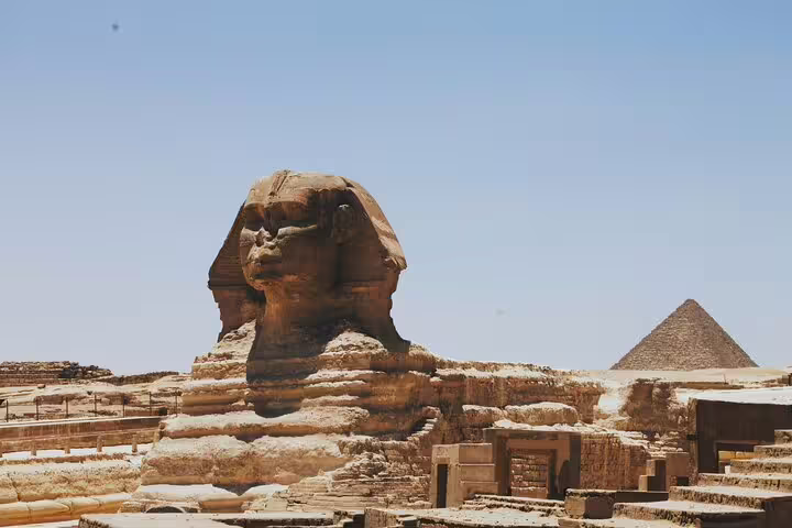Great Sphinx of Giza with pyramid backdrop on a private Port Said to Cairo day tour of pyramids and museum