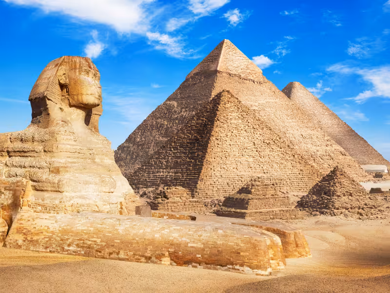 Great Sphinx and Giza Pyramids under blue sky, Cairo highlight on Best of Egypt 5-star cruise package