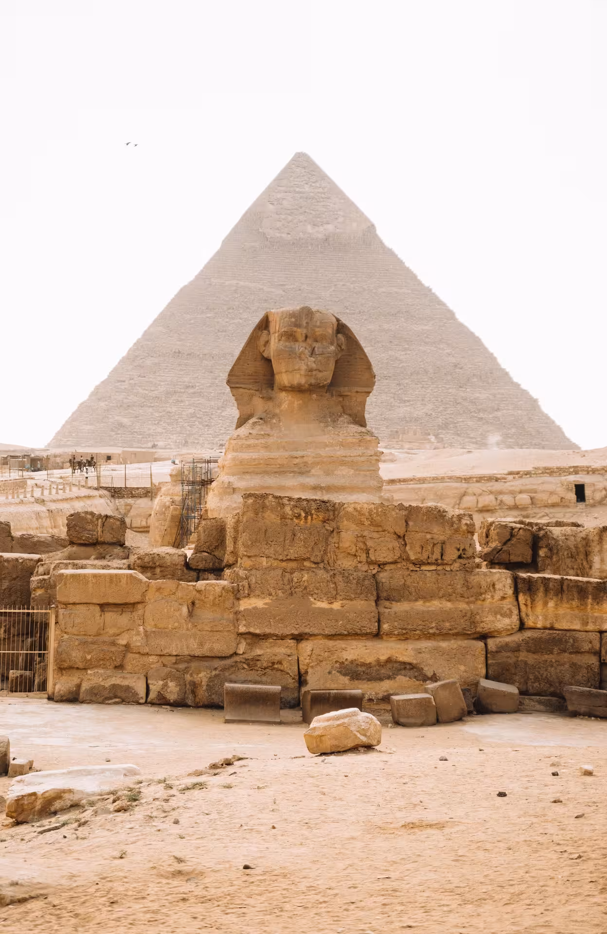 Great Sphinx of Giza with the Pyramid of Khafre rising behind it on the Giza Plateau, Egypt