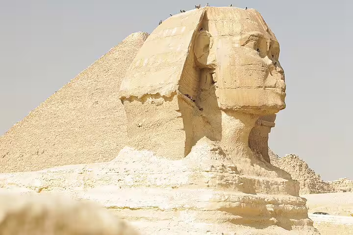 Great Sphinx with Pyramid of Khafre behind it on Giza day tour with camel ride from Cairo