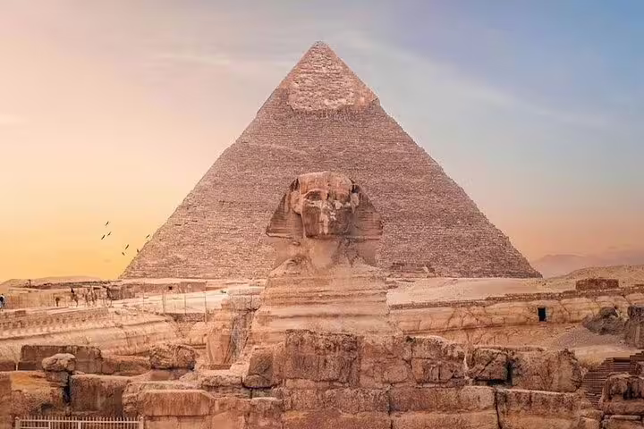 Great Sphinx and Pyramid of Khafre at sunset on Cairo day tour by plane from Sharm El Sheikh