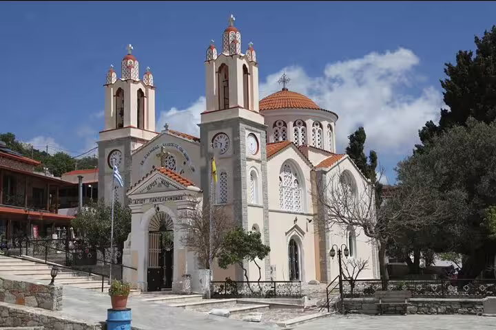 Greek Orthodox church with twin bell towers in Limni village, visited on a private car day trip from Rhodes