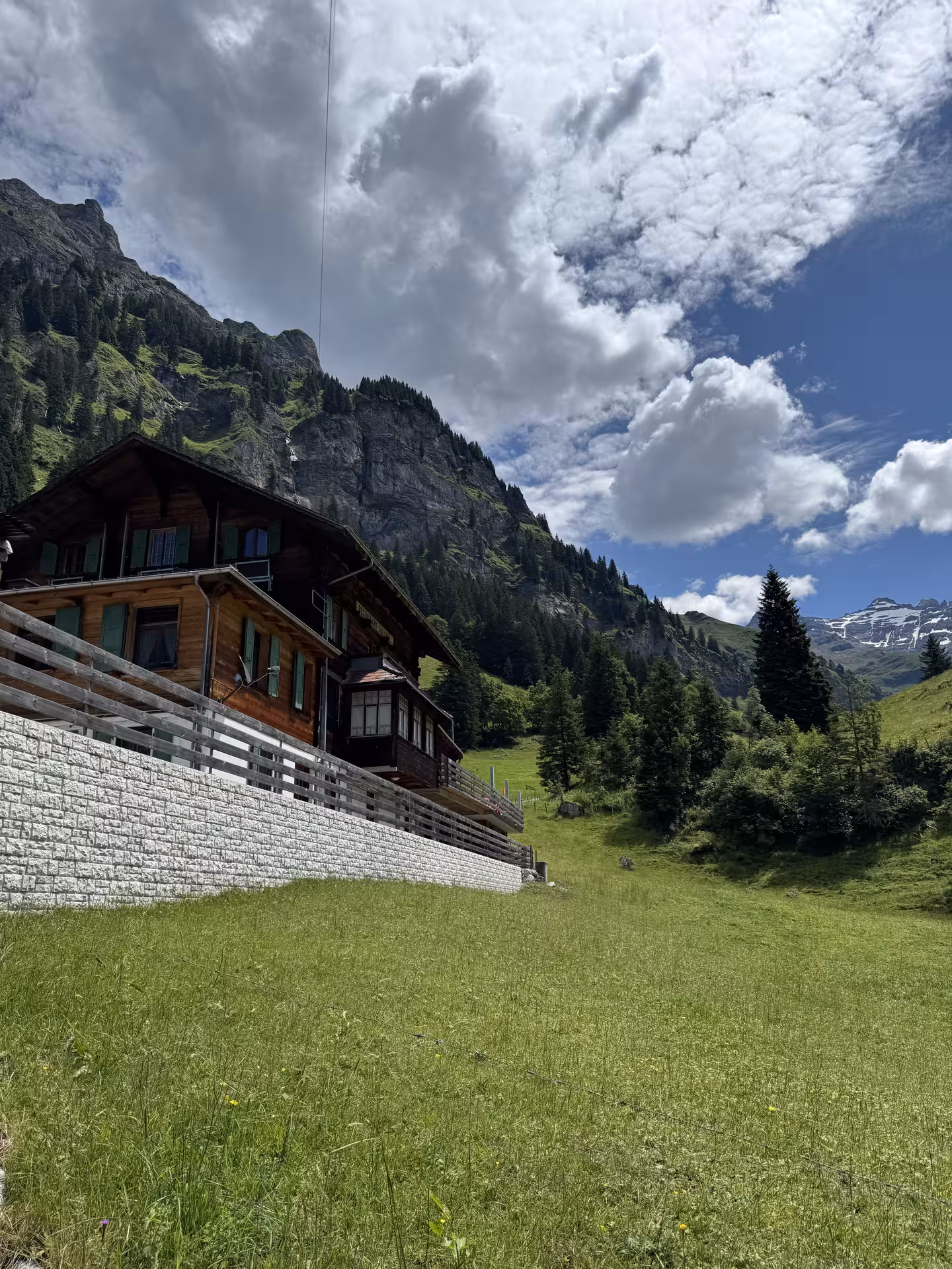 Traditional chalet in Griesalp alpine valley, perfect scenery on the UNESCO E-bike tour in Switzerland
