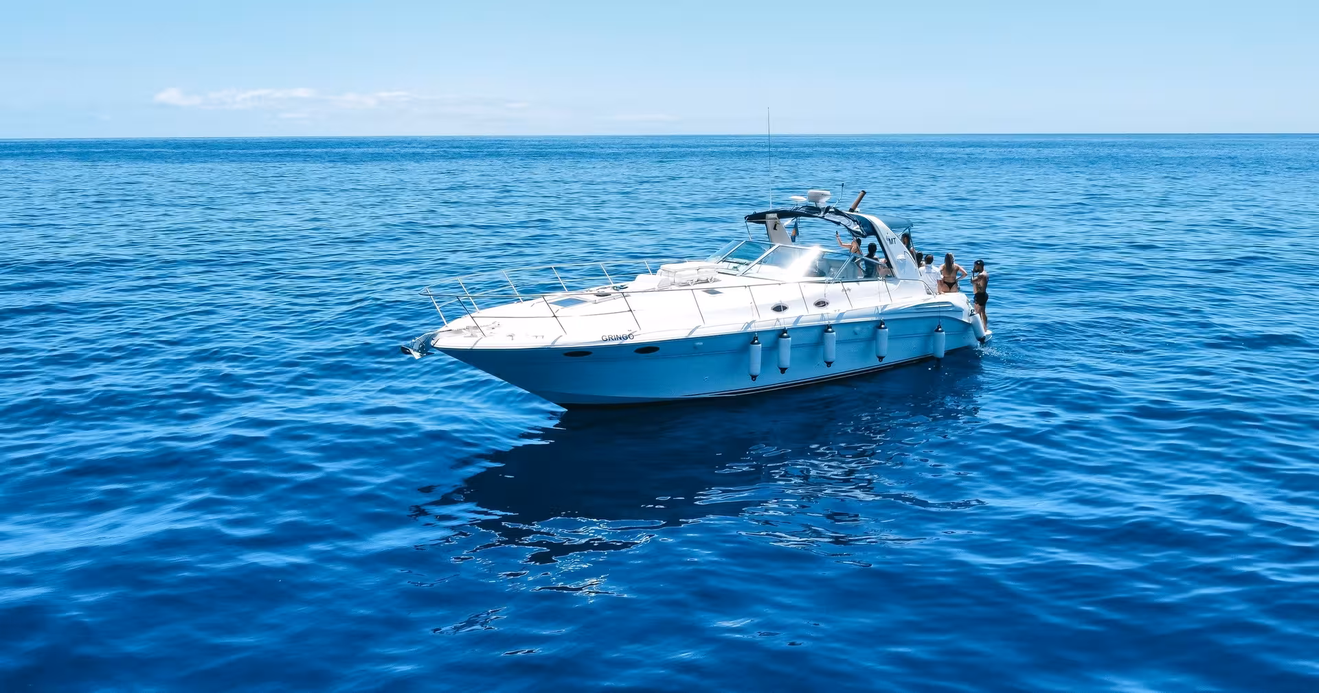 Enjoy luxury and relaxation aboard the GRINGO yacht, a private charter destination on pristine blue seas.