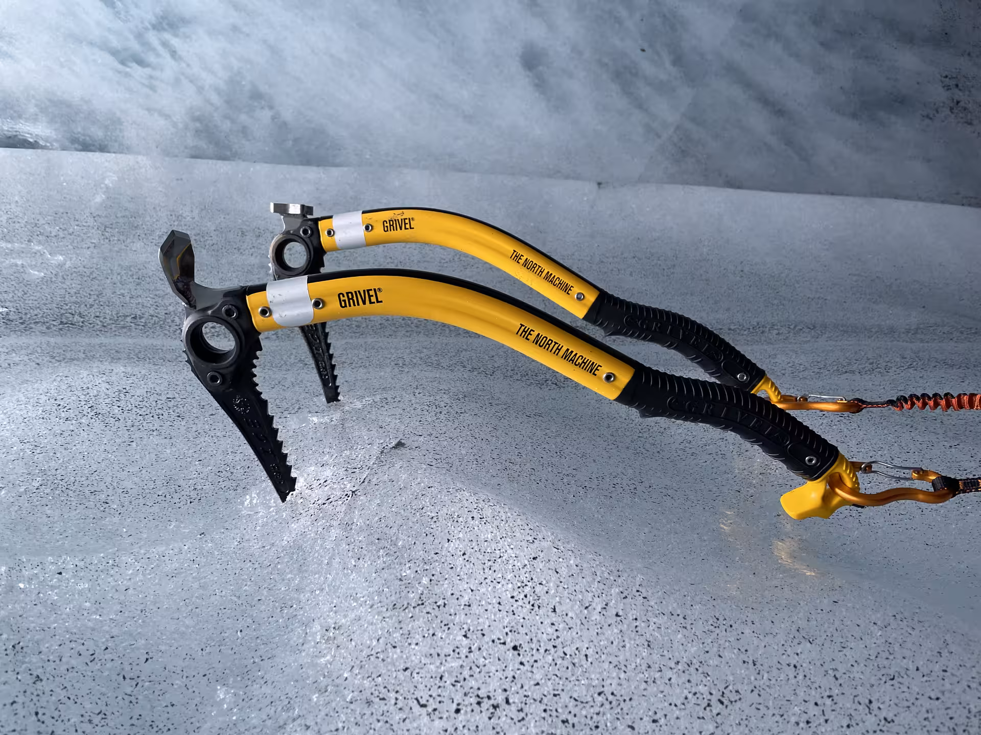Pair of Grivel The North Machine ice axes on glacier surface at Solheimajokull
