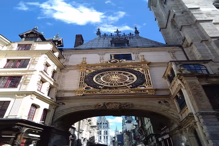 Gros Horloge Renaissance astronomical clock arch over Rouen old town street, Normandy France