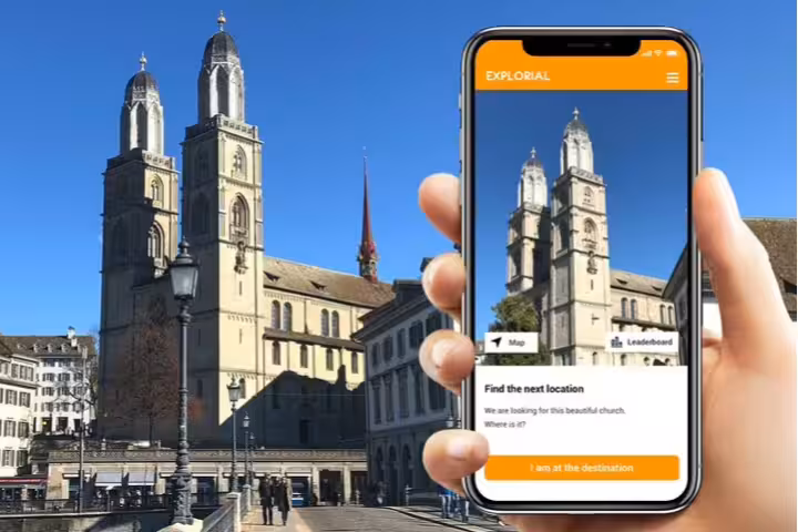Grossmünster Zurich with smartphone app for self-guided scavenger hunt and sights tour, interactive city walk