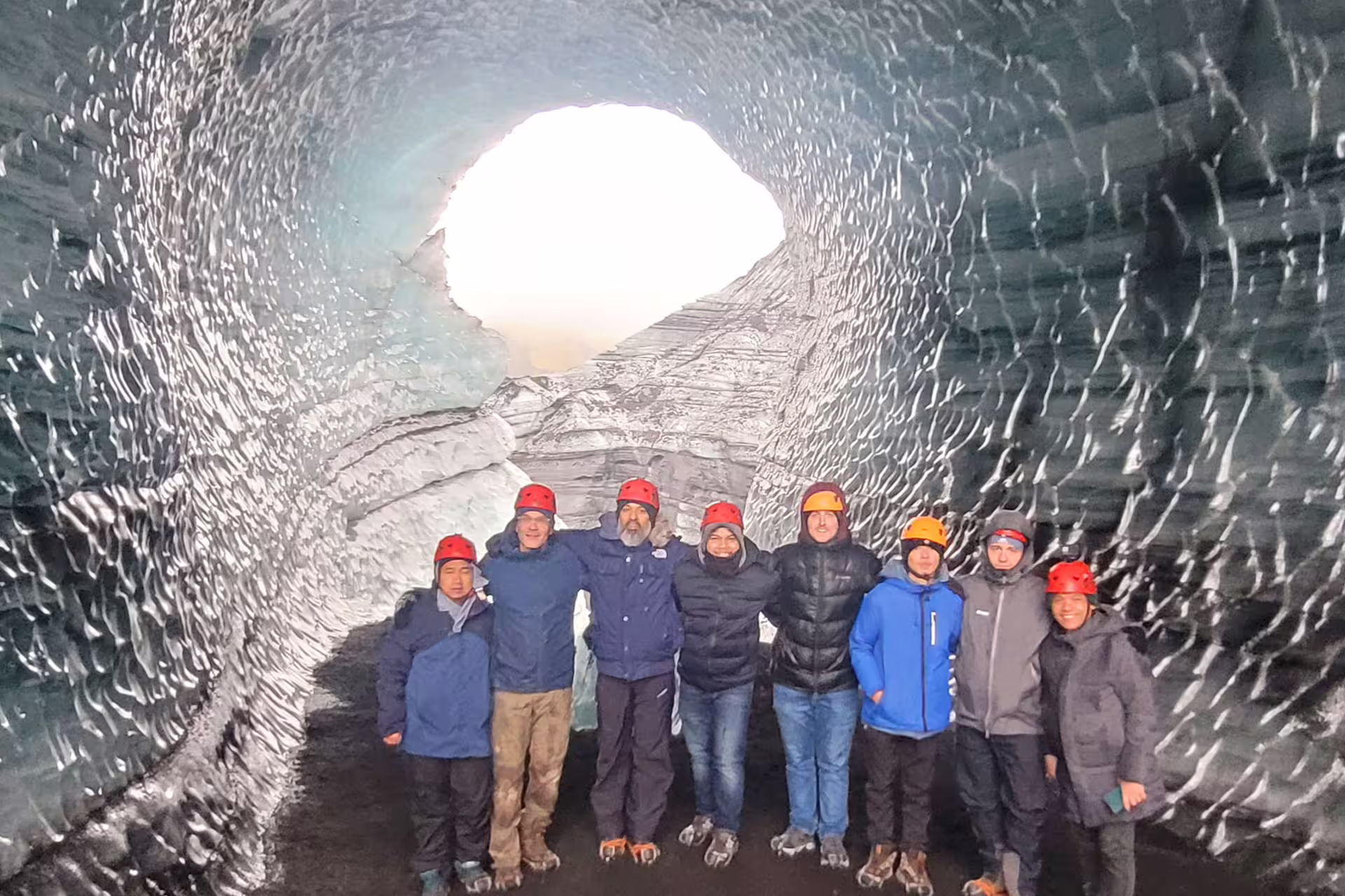 Group photo inside an ice cave.