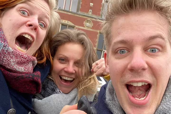 Excited group selfie on the e-Scavenger Hunt Utrecht, a fun self-paced city exploration game with friends