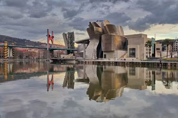 Guggenheim Museum Bilbao and La Salve Bridge on the Nervión River, key stop on a self-guided e-scavenger hunt