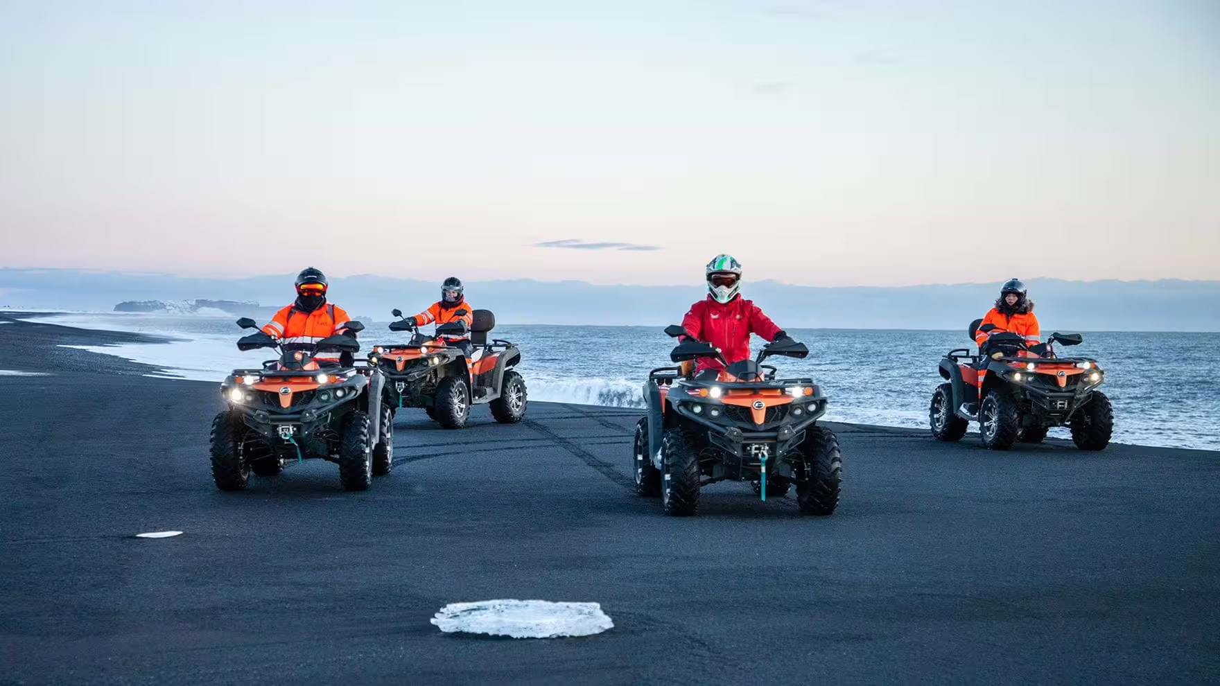 Guided ATV adventure on Iceland black beach with ocean views, part of a private South Coast excursion