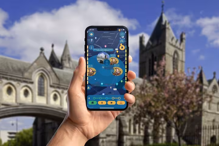 Explorer uses guided walking tour app near Christ Church Cathedral uncovering Dublin city hidden gems and landmarks