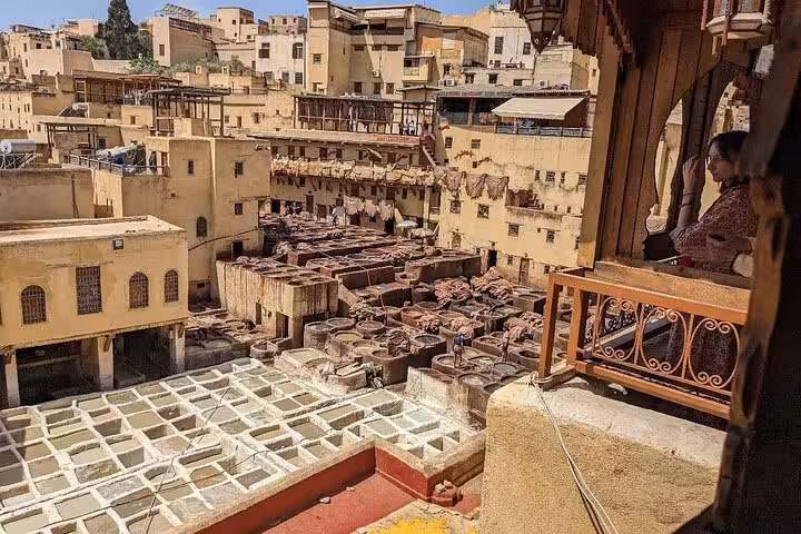 Overlooking the bustling tanneries in Old Medina Fez, highlighting traditional leather crafting on a guided walking tour.