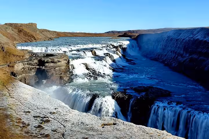 Gullfoss waterfall cascading into a deep canyon on Iceland's Golden Circle route