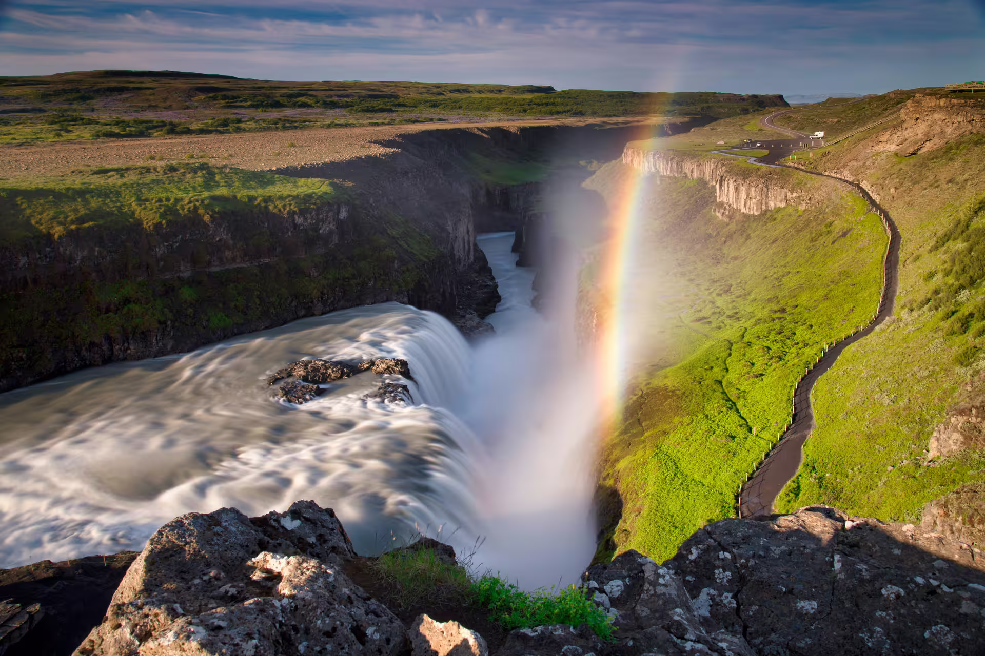 Gullfoss waterfall with rainbow and green canyon on Iceland's Golden Circle route