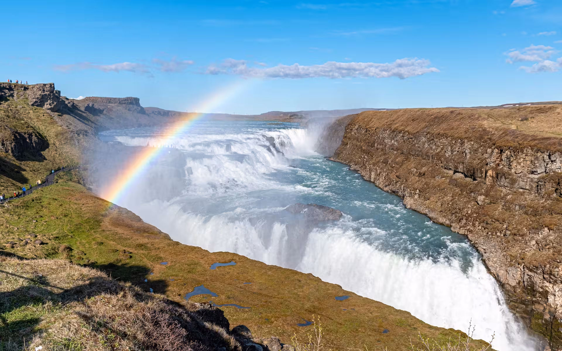 Gullfoss waterfall with rainbow on Iceland's Golden Circle tour from Reykjavik