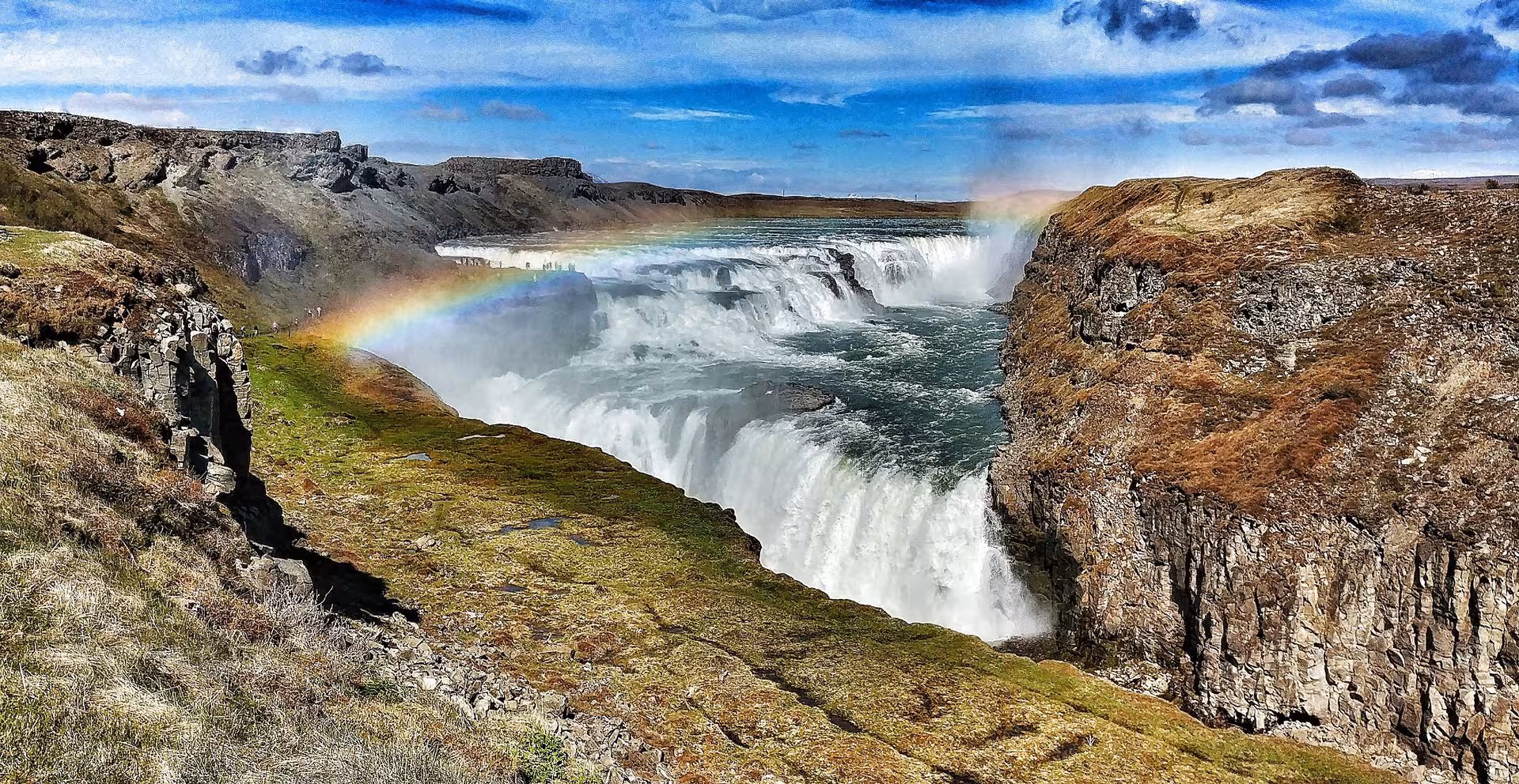 Gullfoss waterfall with rainbow and canyon on Iceland super jeep adventure tour