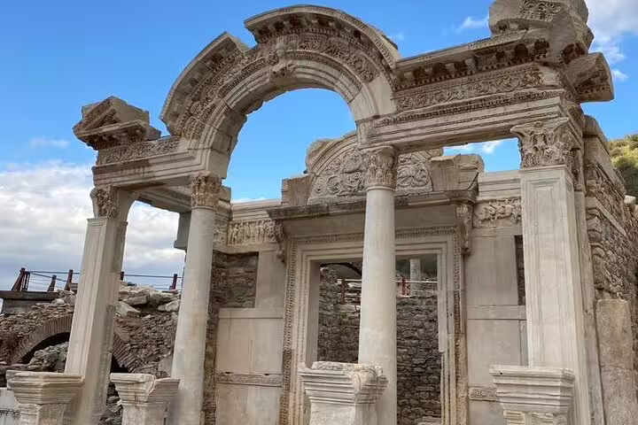 Ornate Hadrian Temple arch in Ephesus ruins, highlight of a private Ephesus and Sirince village tour