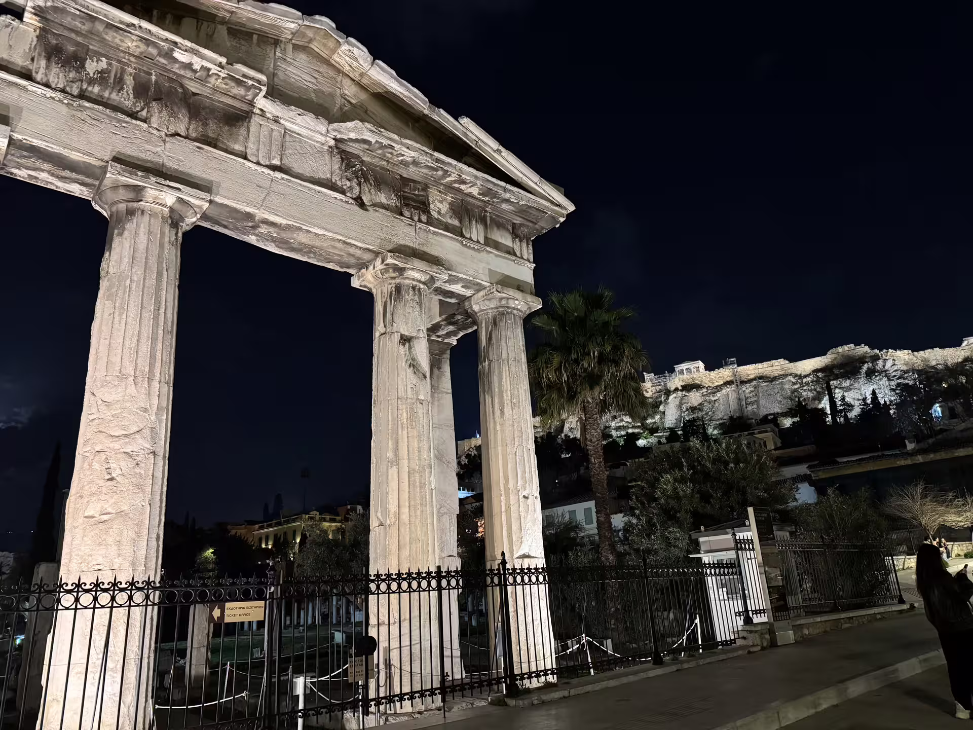 Hadrian’s Arch lit at night near the Acropolis, a highlight on an Ancient Athens full-day private tour