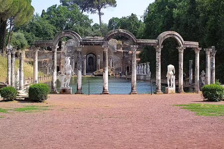 Ancient Roman columns and statues at Hadrian's Villa, Tivoli, a must-visit on a Rome day trip.