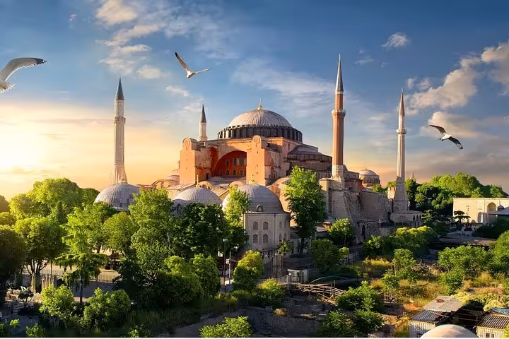 Hagia Sophia at sunset with minarets and gardens, must-see stop on 5-day guided Istanbul Ephesus Pamukkale tour
