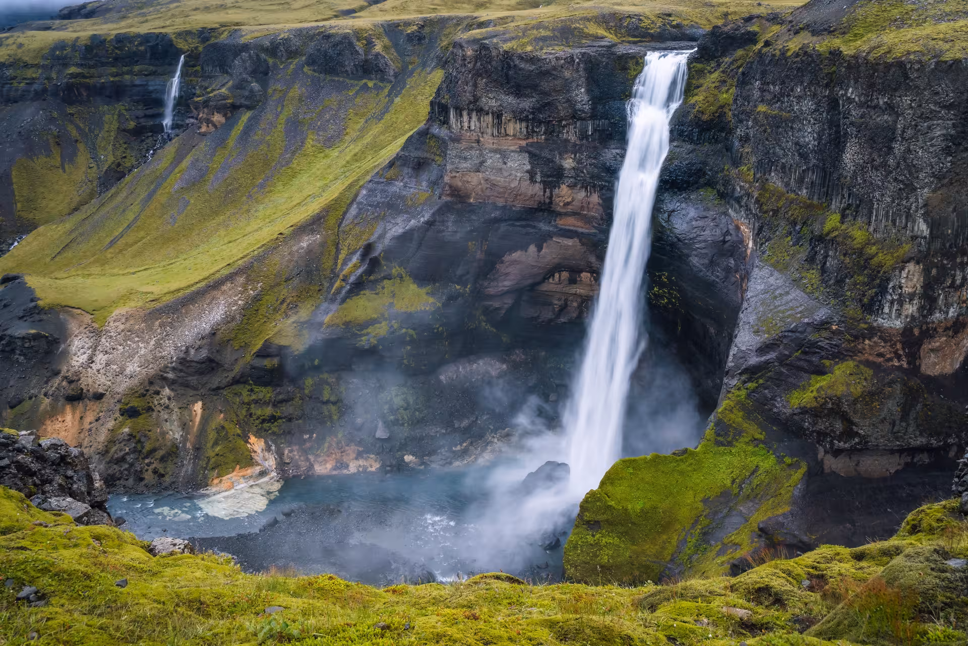 Háifoss waterfall plunging into a canyon in Þjórsárdalur Valley on a private Iceland Highlands tour