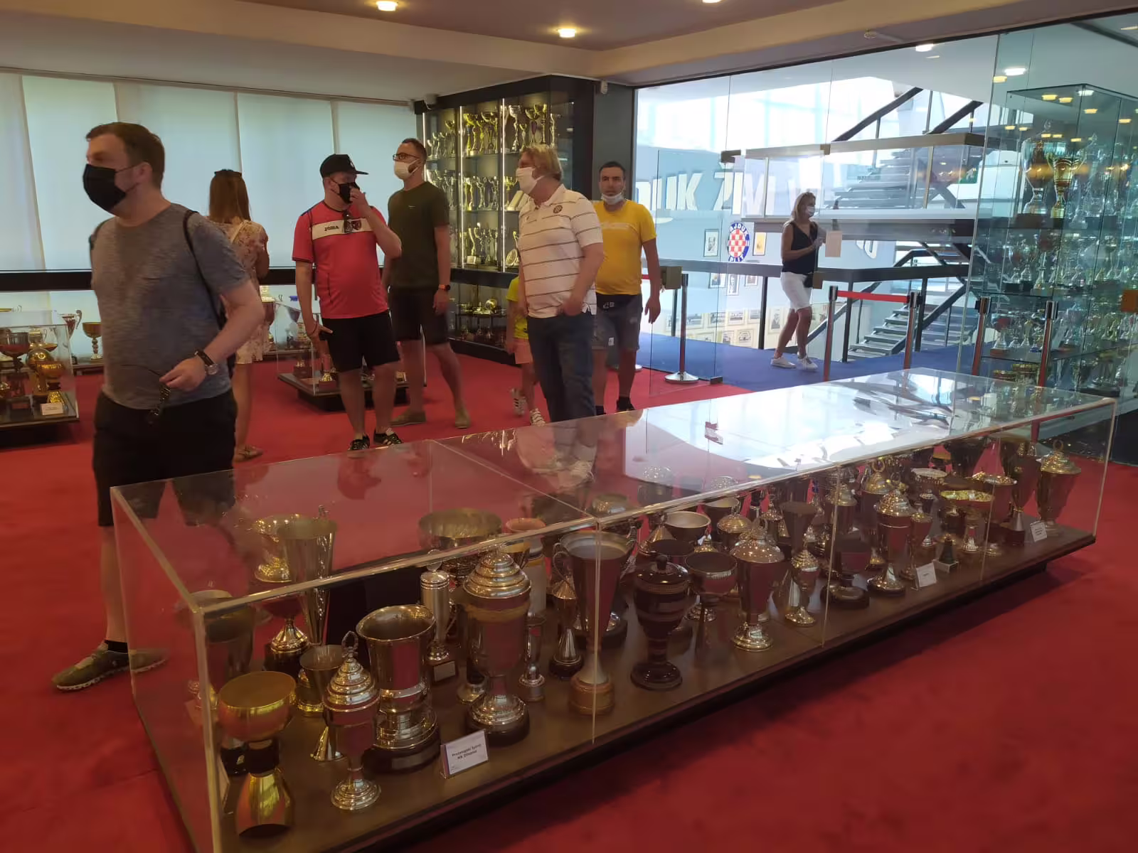 Visitors explore Hajduk Split trophy room at Poljud Stadium on the Bike, Beer & Poljud Stadium Tour in Split