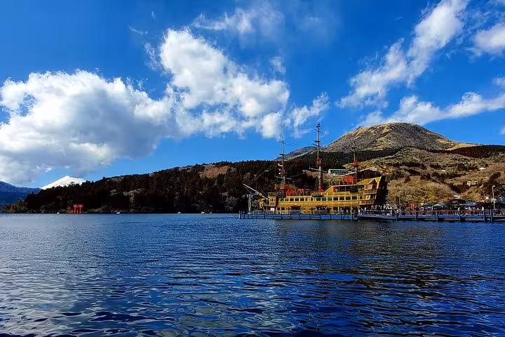 Hakone Lake Ashi pirate ship cruise with Mt Fuji snow cap and iconic torii gate in the background