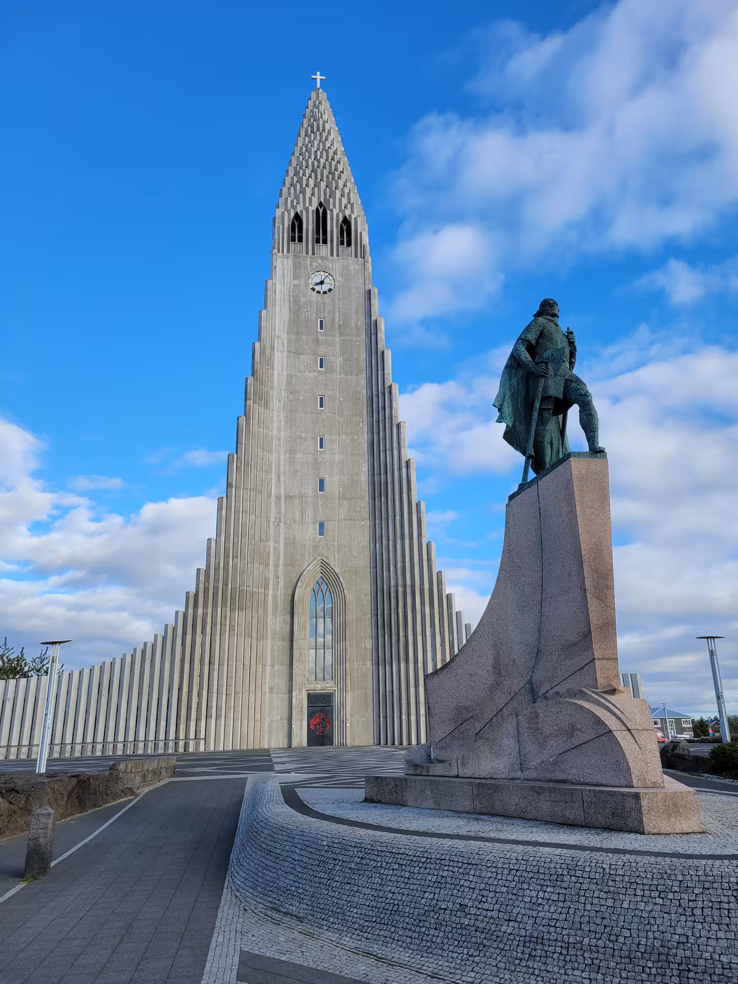 Iconic Hallgrimskirkja church and statue in Reykjavik, a must-see on an 8-day Iceland small group journey.