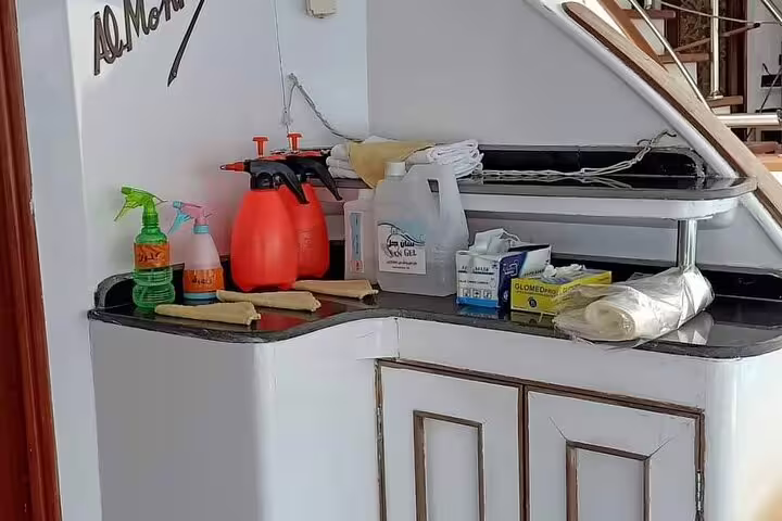 Safety and hygiene station on VIP boat for Hamata Island snorkeling tour from Marsa Alam, Red Sea day trip