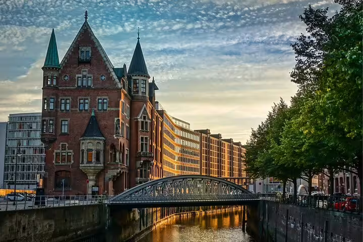 Wasserschloss and bridge in Hamburg Speicherstadt at sunset, scenic highlight on a self-guided scavenger hunt