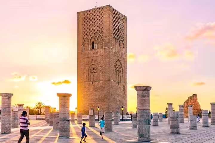 Hassan Tower Rabat at sunset, historic landmark on private 6-day Morocco desert tour from Casablanca to Marrakech