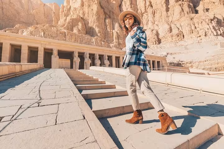 Traveler at Hatshepsut Temple, West Bank Luxor, on a private day tour with flexible itinerary and carriage ride