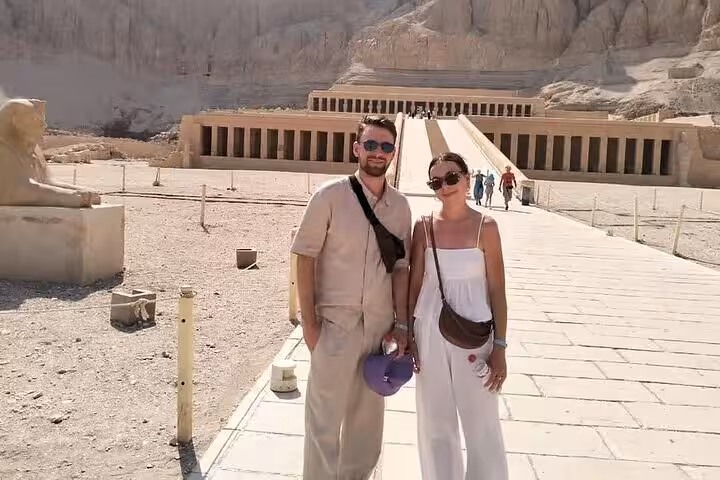 Travelers at Hatshepsut Temple on Comfort Luxor day trip from Hurghada, Valley of the Kings and tombs tour