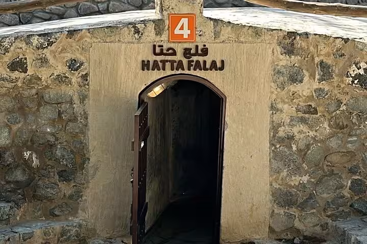 Hatta Falaj tunnel entrance at heritage site, authentic stop on private Hatta city tour for 1-6 people