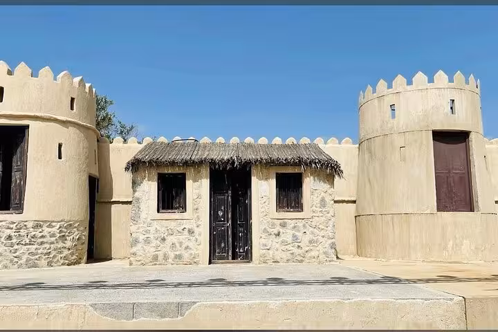 Traditional fort-style buildings at Hatta Heritage Village, cultural stop on private full-day Hatta tour