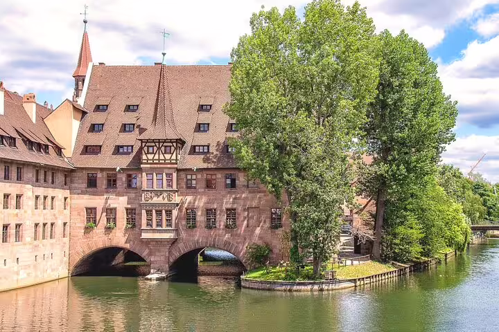 Heilig-Geist-Spital over the Pegnitz River in Nuremberg, a top stop on a self-guided scavenger hunt tour