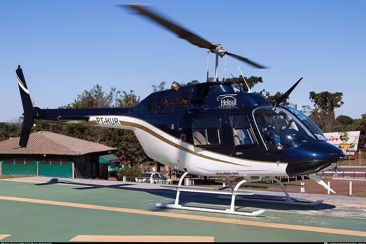 Helicopter ready for a panoramic flight over Foz de Iguaçu, showcasing main attractions from the sky.
