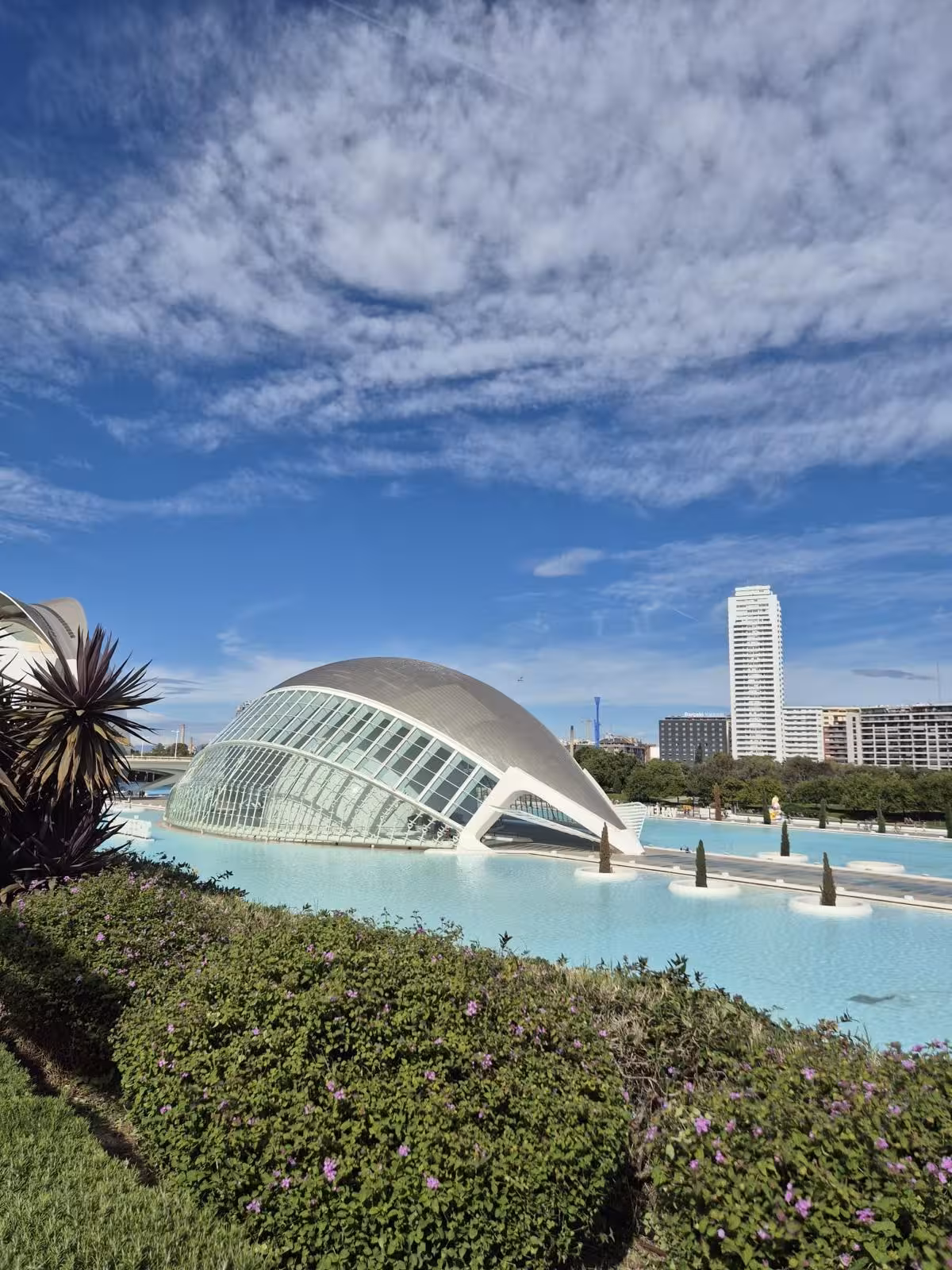 Hemisfèric at Valencia City of Arts and Sciences by turquoise pools, highlight of the audio guided City Quest hunt