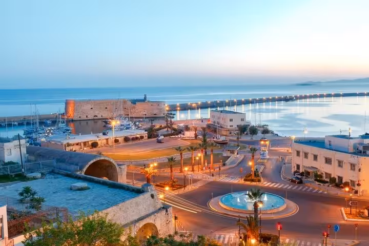 Heraklion Venetian harbor and Koules Fortress at dusk, scenic stop on Knossos day tour from Rethimno
