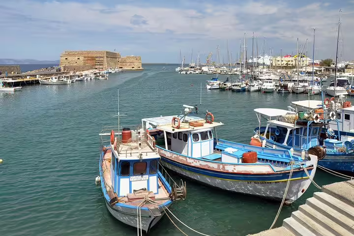 Heraklion Venetian port with boats and Koules Fortress, panoramic city tour highlight after Knossos Palace visit