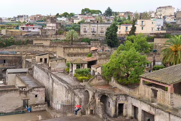 Panoramic view of Herculaneum archaeological site and modern Ercolano from above on a private guided tour near Naples, Italy