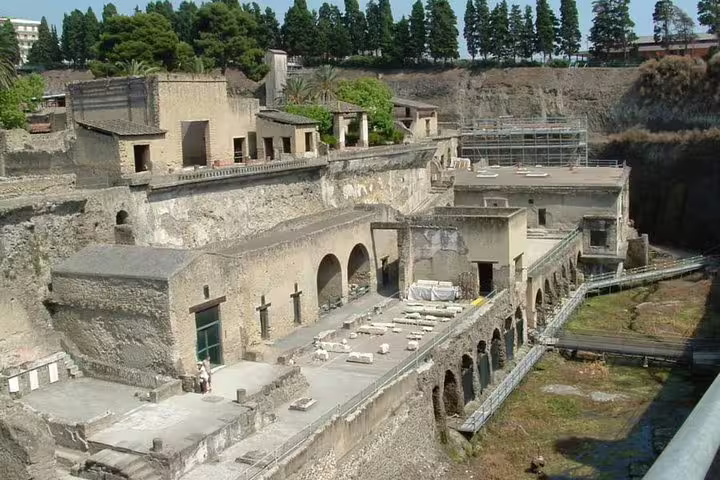 Terraced archaeological site of Herculaneum with arches and villas visited on a private Pompeii and Vesuvius tour